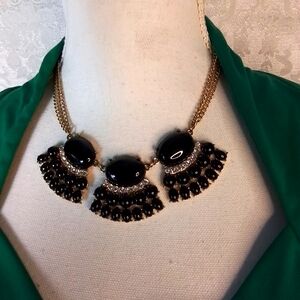 Black cabochons and beads with clear rhinestones and gold chains necklace
